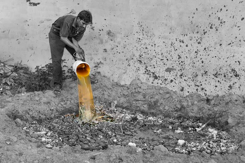 Raw effluent from a septic tank being directly disposed at a vacant plot in a peri-urban colony in Bareilly city, Uttar Pradesh